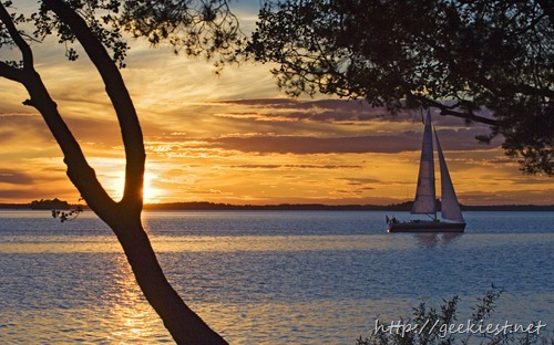Yacht on Lake Malaren at sunset, Sundbyholm Manor, Sweden