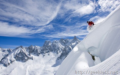 Skier descending mountain, near Chamonix-Mont-Blanc, France