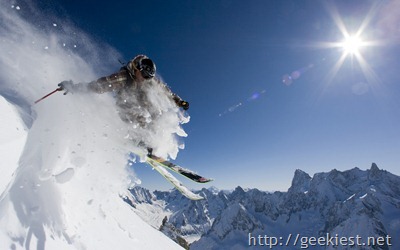 Skier in a puff of snow, near Chamonix-Mont-Blanc, France