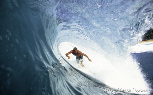 Surfing in the tube, Oahu, Hawaii
